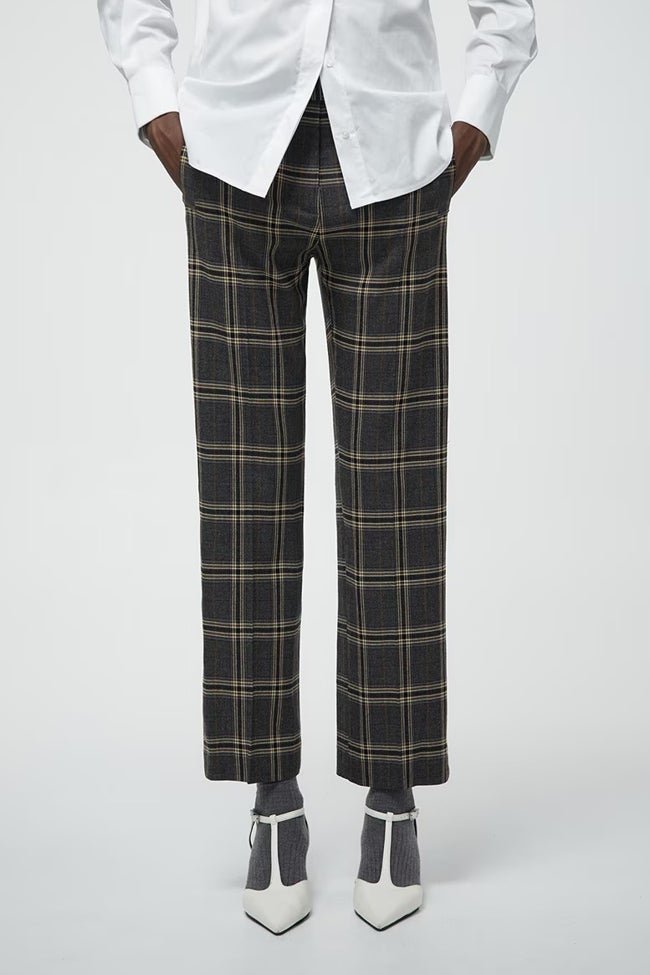 Pantalon à carreaux Sfera (39,99 euros)
