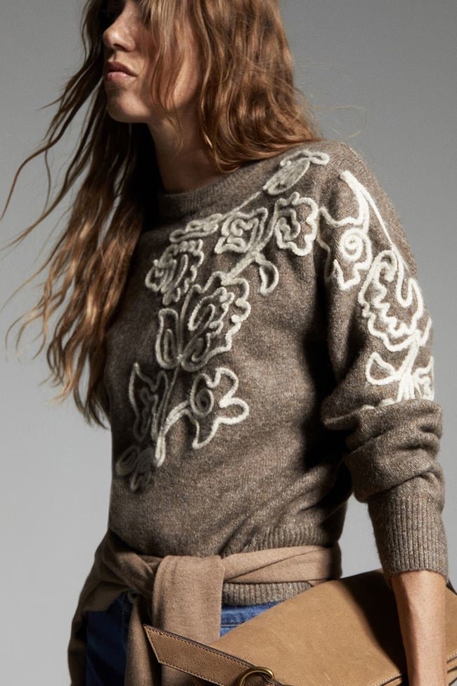 Pull à fleurs Sfera (35,99 euros)